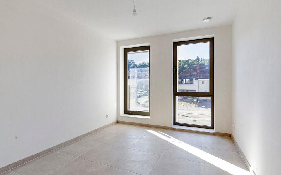 Op zoek naar een ruim appartement met twee slaapkamers, royale buitenruimtes en een uitstekende bereikbaarheid? Dan is dit recente appartement aan de Leuvensesteenweg 209 in Aarschot zeker een bezoek waard.

Het appartement bevindt zich op de eerste verdi